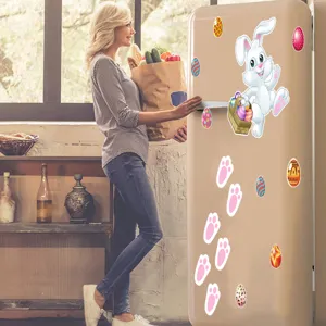 Adhesivo magnético para nevera de pascua detalle con conejito y huevos coloridos.