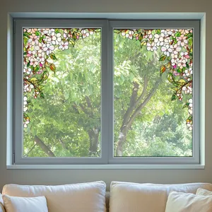 Detailed view of decorative stained glass window film featuring elegant floral botanical patterns.