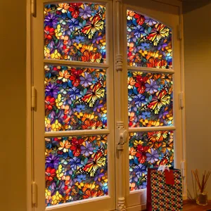Stained glass window film with colorful flowers and butterfly pattern, detailed view.