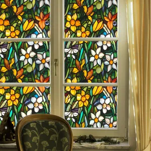 Detailed view of stained glass window film featuring a colorful floral daffodil pattern.