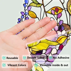 Static stained glass window film detail showing vibrant floral pattern, reusable and adhesive-free.