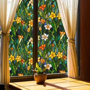 Stained glass window film detail showing colorful floral pattern and light effect.