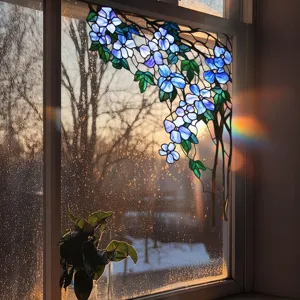 Detail shot of blue floral stained glass window film showing vivid translucent light effect.