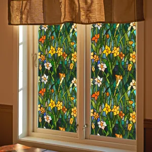 Decorative stained glass window film with colorful floral pattern for home privacy and glass decor.