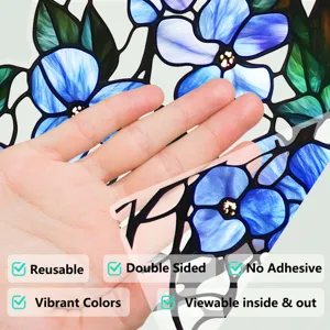 Detail view of blue floral stained glass window film, showing static cling and peel-off design.