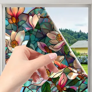 Stained glass floral window film detail showing static cling peel design effect clearly.