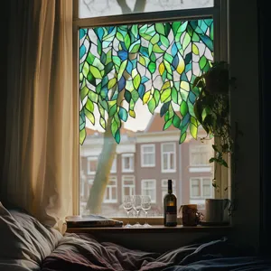 Static cling window film with green leaves pattern, privacy stained glass sticker for home decor.