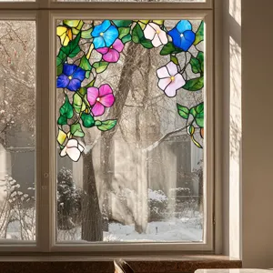 Detail view of colorful floral stained glass window film, decorative privacy sticker for home.