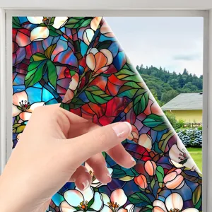 Decorative stained glass window film with vibrant floral pattern for privacy and sun protection.
