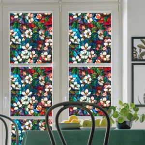 Decorative stained glass window film with vibrant floral pattern for home privacy and sun shading.