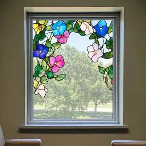 Decorative stained glass window film featuring vibrant floral vines for privacy and style.