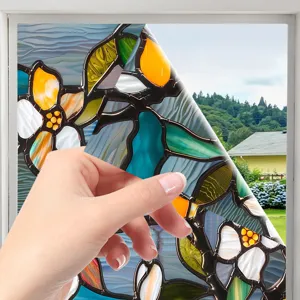 Stained glass window film detail showing floral pattern and easy peel static cling application.