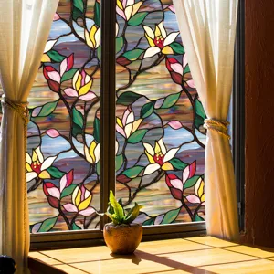 Decorative stained glass window film with elegant floral pattern for home privacy.