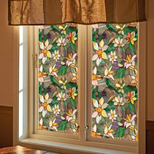 Stained glass window film with vibrant floral botanical patterns for home privacy and glass decor.