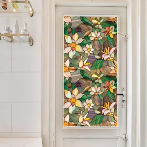 Decorative stained glass window film with colorful floral pattern for privacy and home decor.