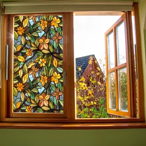 Stained glass window film with vibrant floral pattern for home privacy and decorative glass sticker.