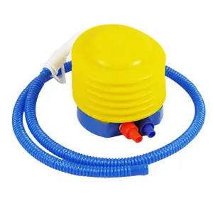 Portable foot pump with blue hose and yellow bellows, detailed view of inflation ports.