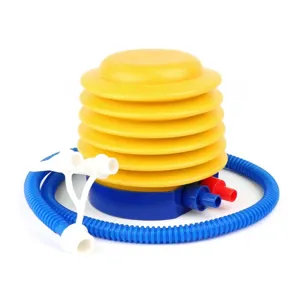 Foot pump detail view showing yellow bellows, blue hose and white valve attachments.