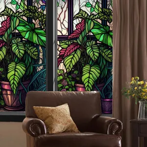 Stained glass window film detail showing vibrant botanical plant pattern on home glass window.