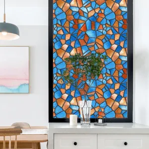 Gedetailleerd overzicht van de kleurrijke retro statische raamfolie met geometrisch mozaïekpatroon.