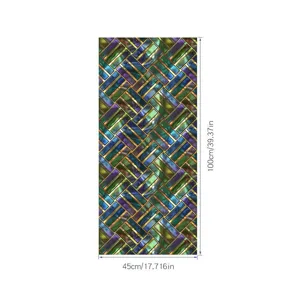 Gedetailleerd overzicht van kleurrijke retro PVC raamfolie mozaïek design 45x100cm.