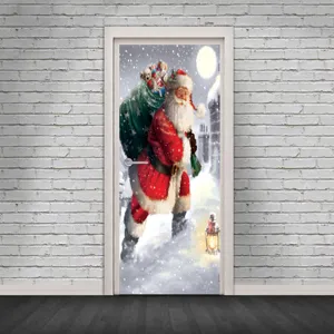 Detalle de pegatina de puerta 3D de Navidad con Papá Noel nieve para decoración festiva.