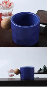 Klein blue ceramic mug with unique wooden ball handle for office and home daily use.
