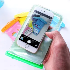 Waterproof phone pouch with transparent PVC design, secure seal, and lanyard for outdoor sports.