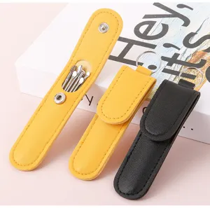 Portable ear pick tool set detail, stainless steel ear cleaning spoon with leather case.