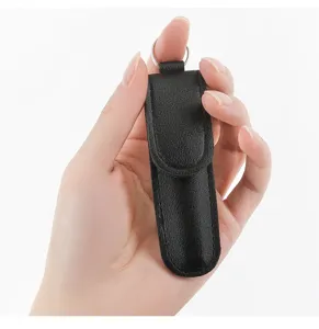 Detailed view of a portable black leather ear pick pouch with metal ring, compact design.