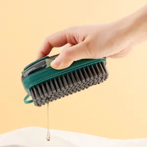 Multi-functional liquid dispensing cleaning brush with durable bristles for shoes and clothes.