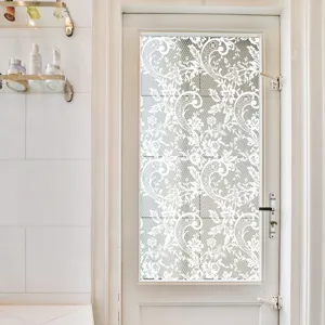 Decorative white lace window film detail shot, static cling glass sticker for home door decor.