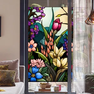 Detailed view of colorful floral stained glass window film applied on home glass door.