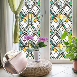 Detailed view of 3D stained glass window film with geometric embossed texture for home decor.