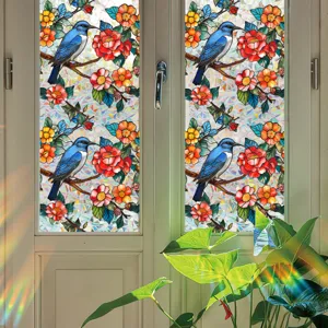 Static cling window film with stained glass bird and flower pattern for home decor.