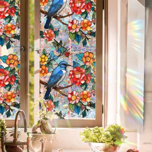 Decorative static window film with stained glass bird and flower design for home glass decor.