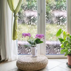 Detailed view of lace window glass film installed on window for privacy and elegant decor.