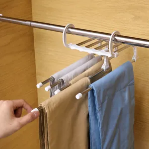 Cintre à pantalon multifonctionnel, porte-pantalon magique pliable pour rangement armoire.