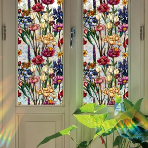 Close-up view of vibrant floral stained glass window film, colorful tulip pattern details.