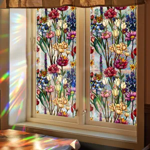 Stained glass window film detail showing colorful floral pattern and beautiful light refraction effect.