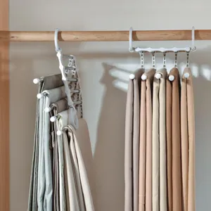 Cintre pour pantalon multifonction pliable, support magique gain de place pour armoire.