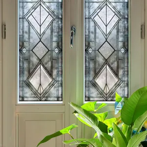 Frosted glass window film detail showing elegant geometric diamond pattern on home window.