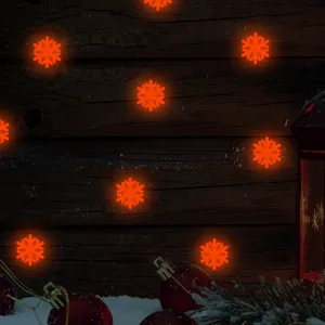 Dettaglio di adesivi murali luminosi con fiocchi di neve di Natale per la decorazione