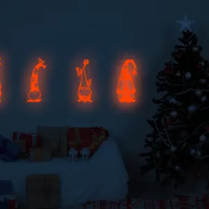 Adesivi murali luminosi di Natale brillano al buio decalcomanie di gnomi festivi.