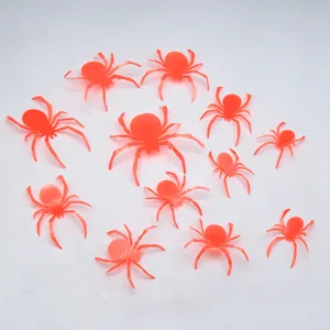 Vista detallada de pegatinas de pared de arañas luminosas 3D para decoración de Halloween.
