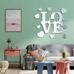 Acrylic mirror LOVE wall sticker detail showing room decoration and heart shapes.