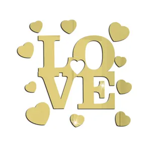 Gold acrylic mirror LOVE wall sticker with cute hearts for romantic Valentine's Day home decor.