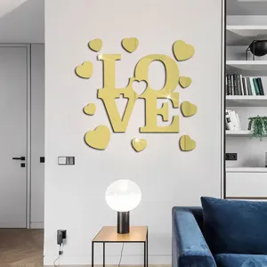Gold acrylic mirror wall sticker featuring LOVE and hearts design for home and Valentine decor