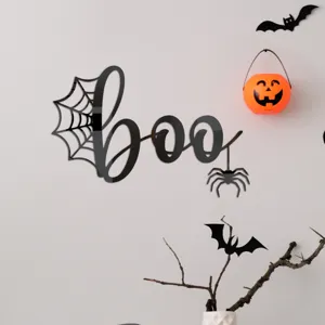 Detailed view of 3D acrylic mirror Halloween wall sticker featuring boo text and spider web.