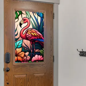 Close up of colorful flamingo stained glass window film applied on wooden door glass panel.